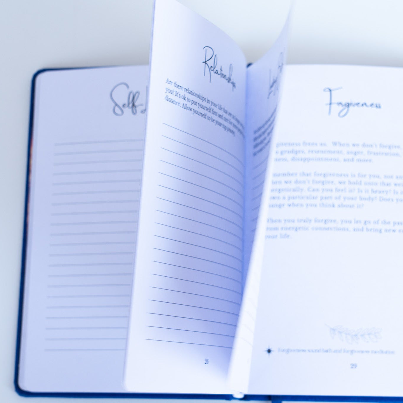 Open notebook with lined pages on a white background